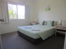 Carpeted Queen Bedroom