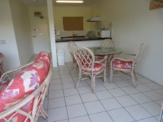 Dining & Kitchen Area With Cane Furniture